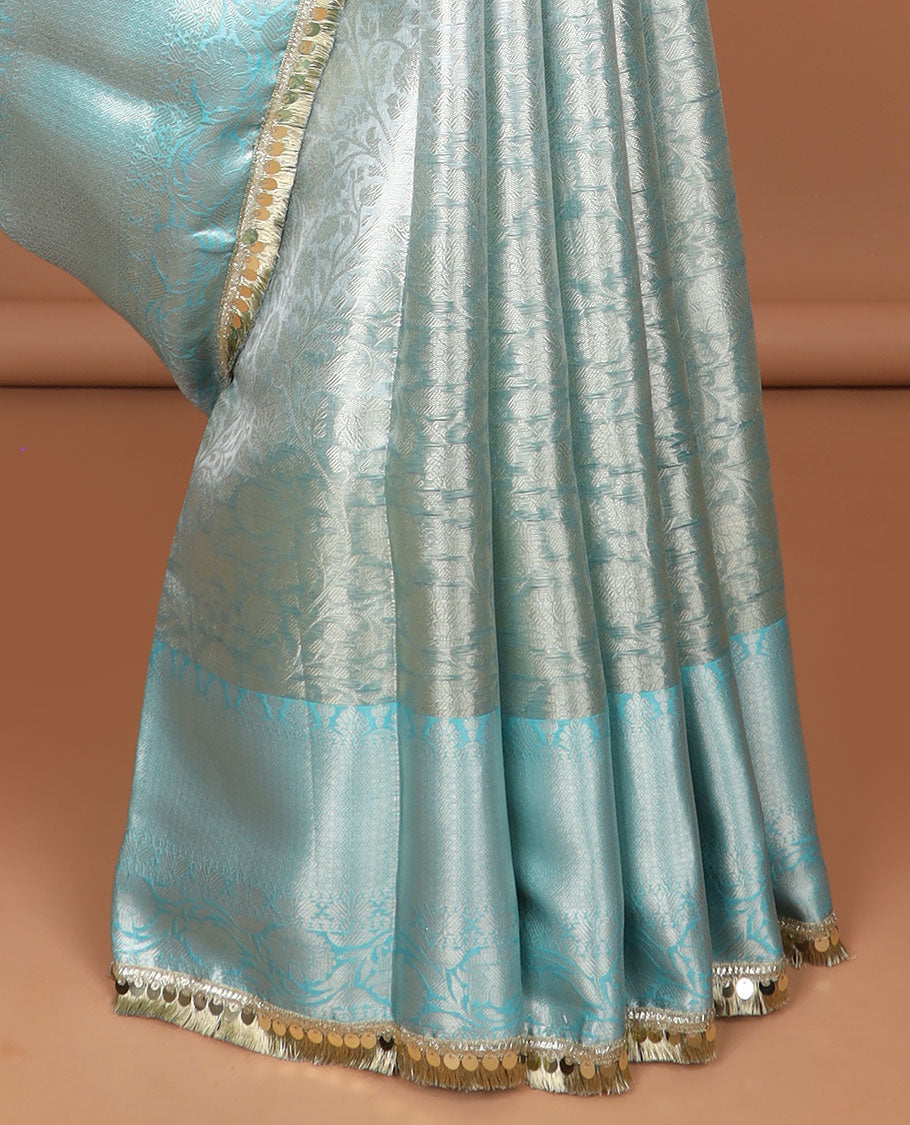Light blue jacquard tissue saree with self floral zari design border & intricate zari design pallu