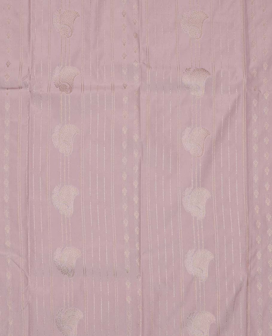 Pastel pink art silk pavadai material, zari design with contrast traditional zari border skirt, and contrast blouse