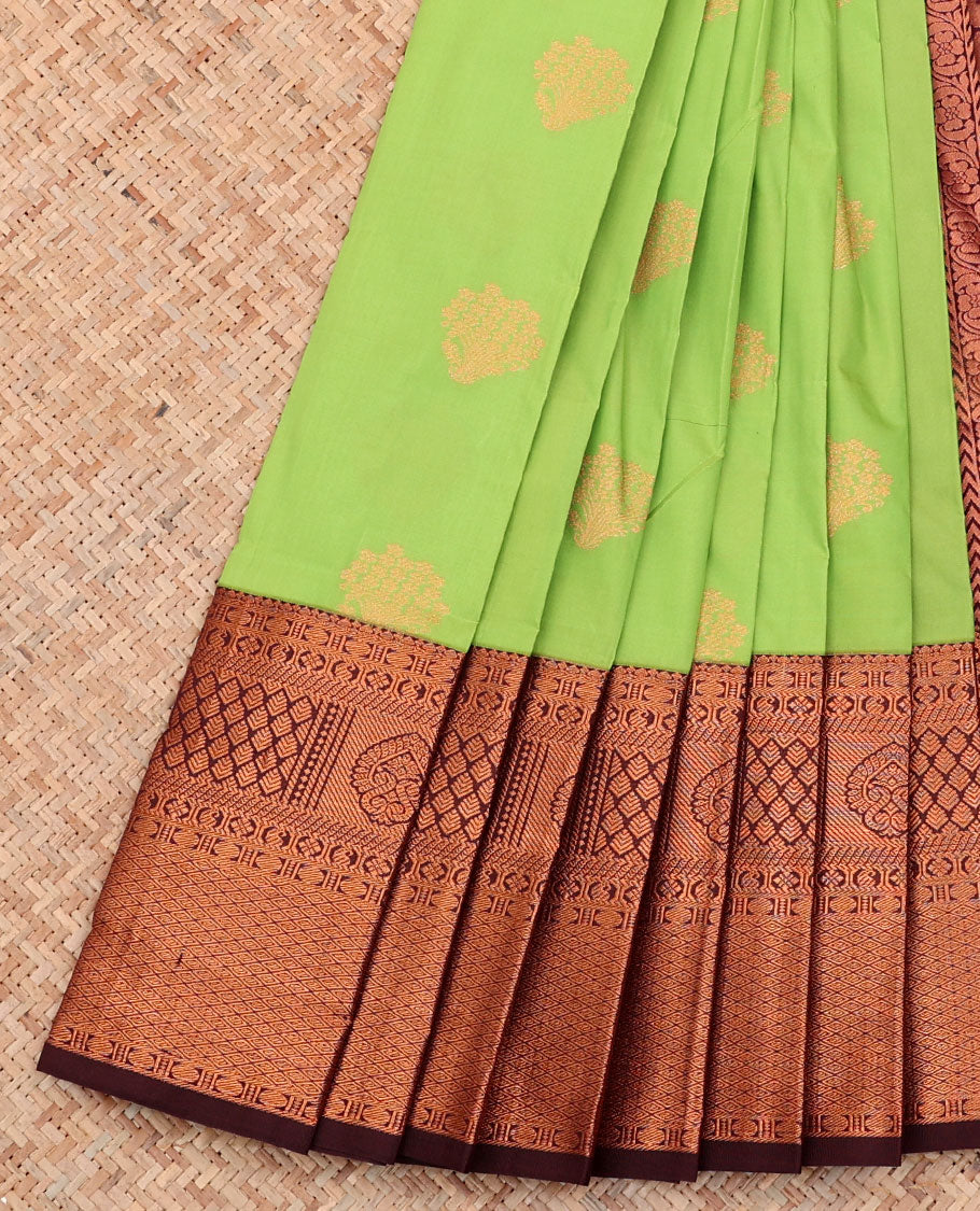 Parrot Green Budget Silk Saree, Woven with Zari Buttas on Its Body, Complemented by a Contrast Traditional Zari Design Border, Pallu Steeped with Floral Designs, and Paired with a Contrast Blouse