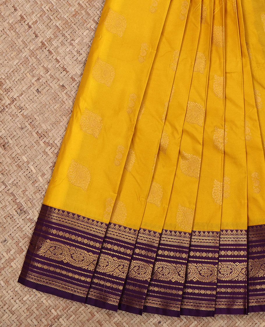 Yellow Budget Silk Saree, Sparsely Woven with Zari Buttas All Over Its Body, Complemented by a Contrast Traditional Zari Design Border, Grand Diagonally Striped Pallu, and Paired with a Contrast Blouse