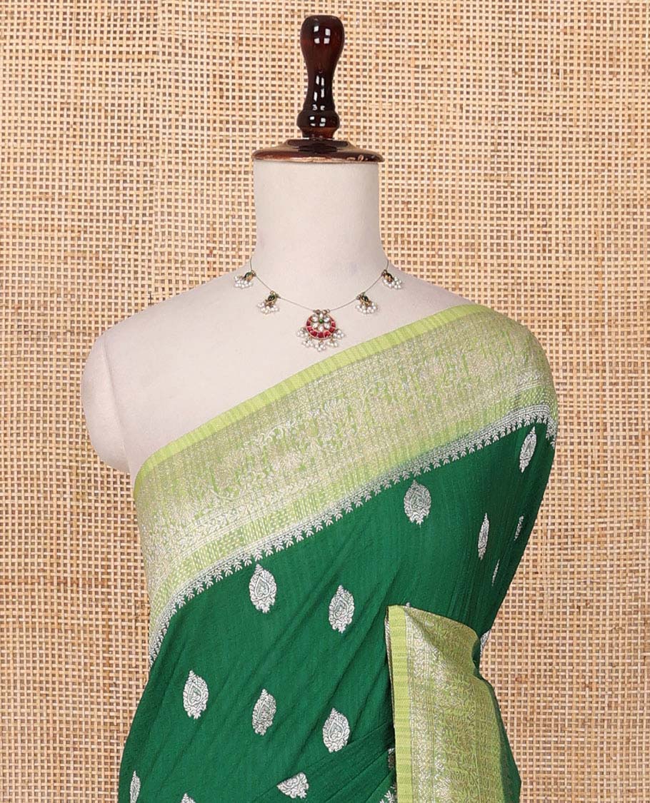 Green zari buttas fancy crepe saree, contrast traditional zari border & intricate pallu