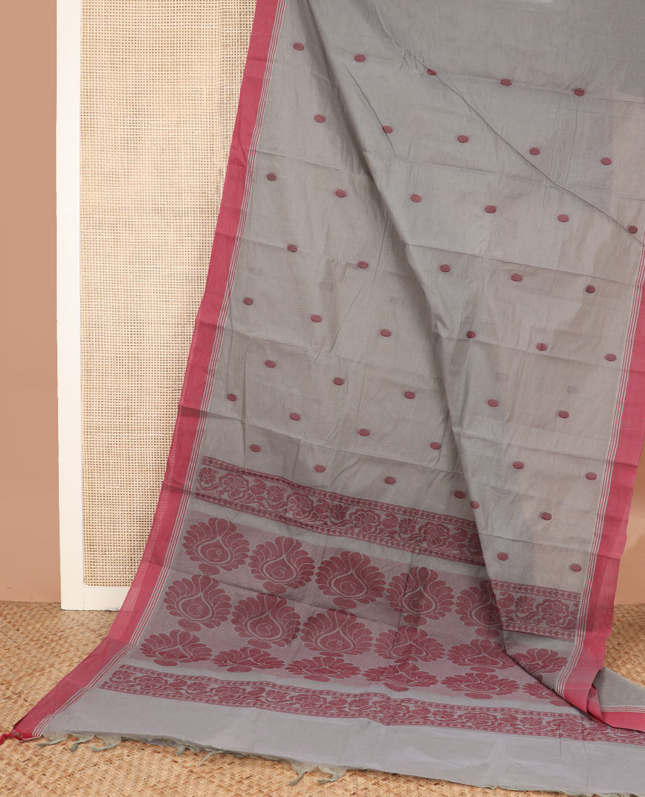 Grey polka dot buttas kanchi cotton saree, contrast border, and intricate design pallu