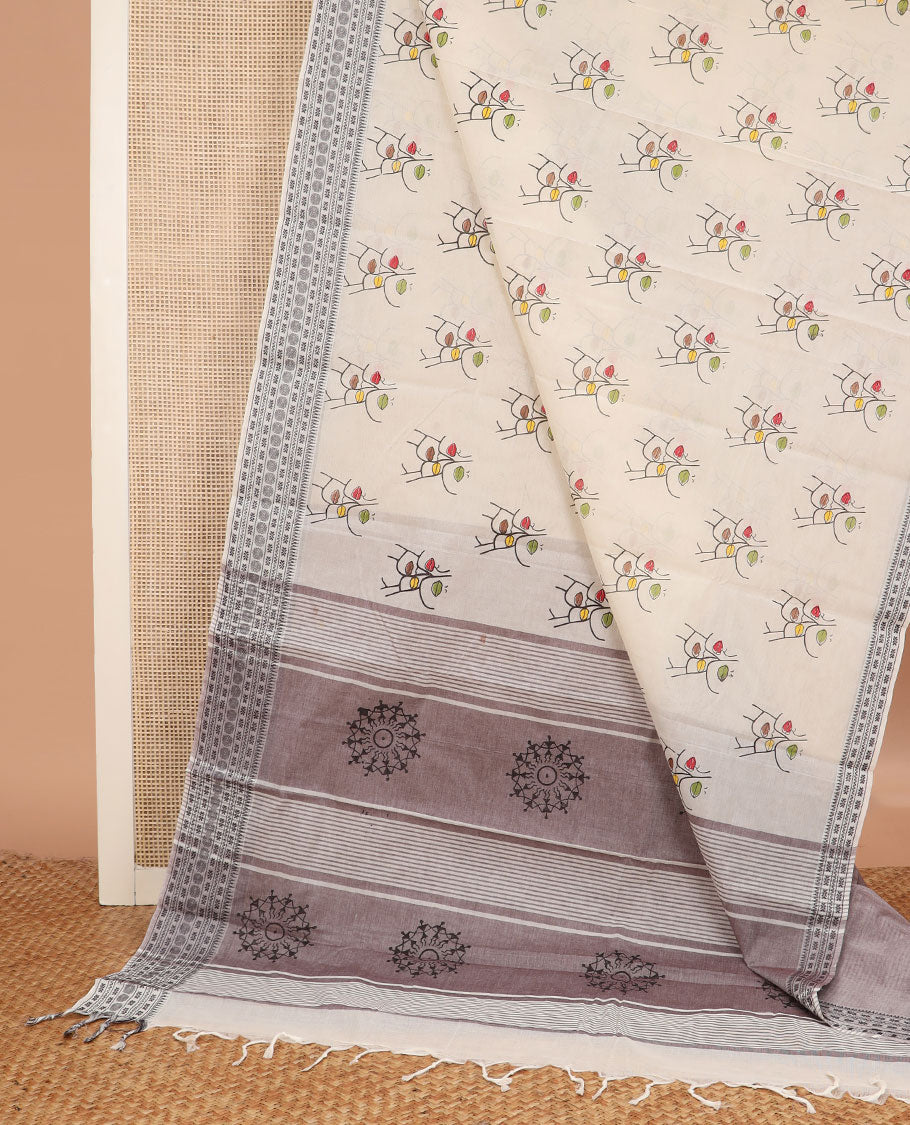 Cream face printed chirala cotton saree, traditional design border, and pallu of warli print