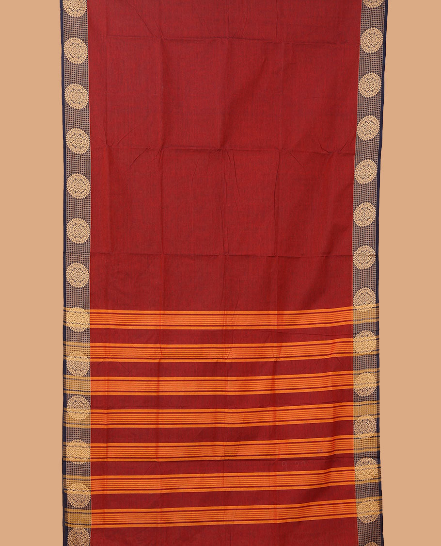 Maroon plain nine-yard cotton saree, contrast chakram motifs border, and pallu of stripes