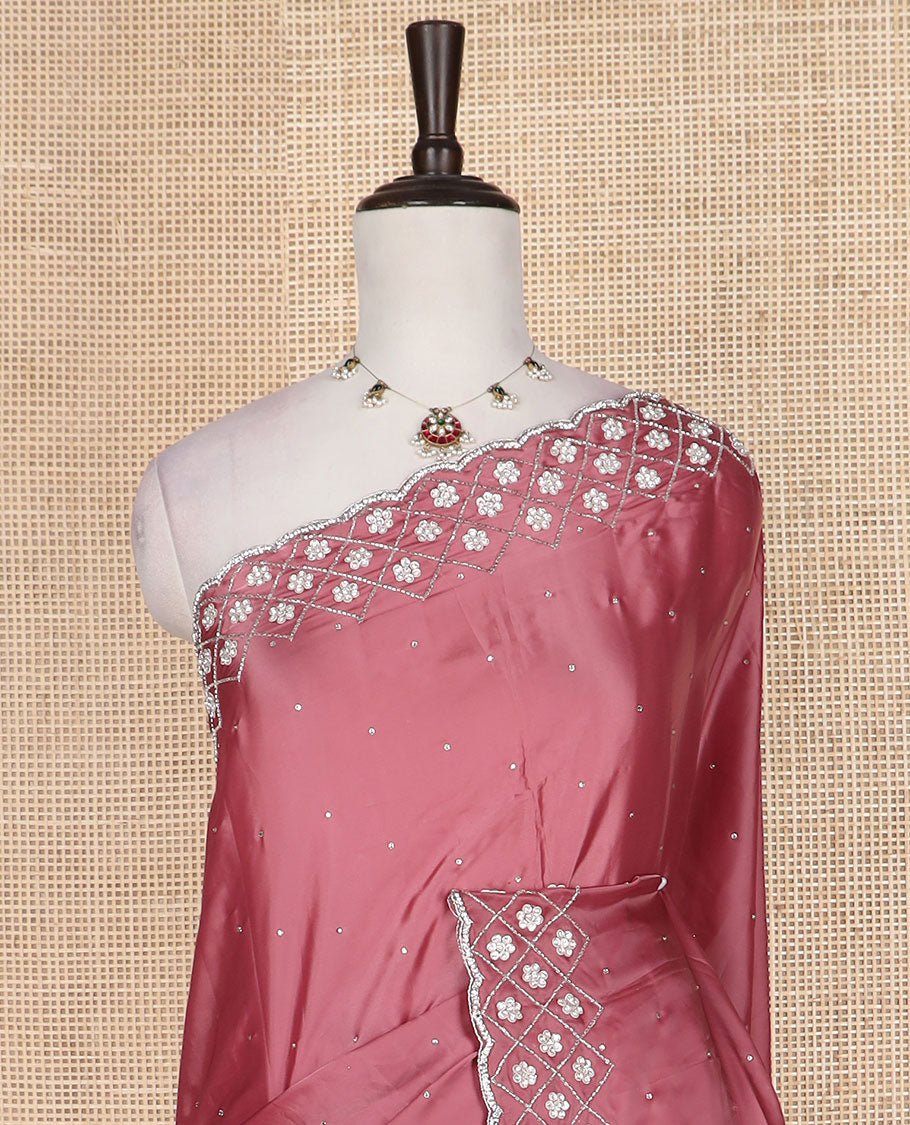 Pink stone embedded designer saree, floral enclosed jaal embroidered scallop border