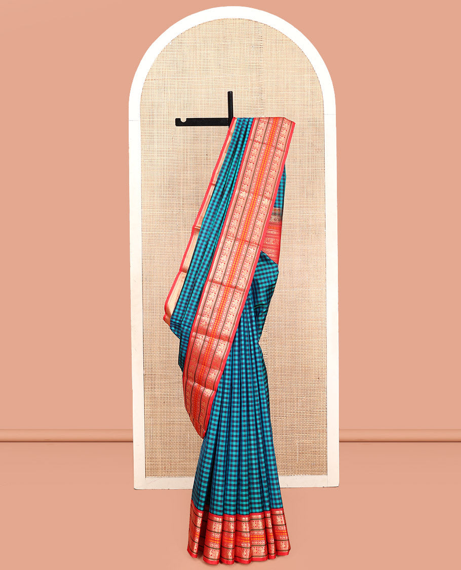 Blue Kanchipuram Silk Saree, Finely Crafted with Kasa-Kasa Checks, Contrast Border of Manga Mokku, Mayil, Poun and Kamalam, Pallu of Traditional Designs, and Contrast Blouse