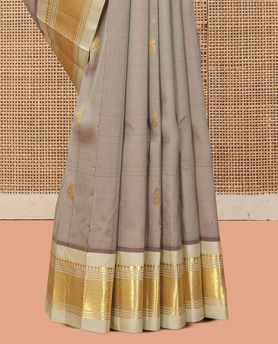 Grey Kanchipuram Silk Saree, Woven with Zari Buttas, a Contrast One-Sided Border of Panner Sombu, Banaras, Muthu, and Mayil Kann Designs, a Zari Design Pallu, and No Blouse