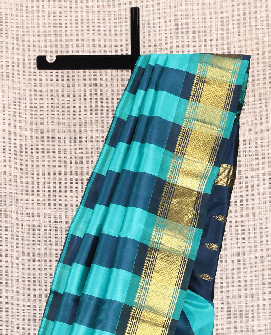 Blue Checked Kanchipuram Silk Saree, a Zari One-sided Border of Paneer Sombu, Banaras, Muthu, and Mayil Kann Designs, Pallu of Zari Designs, and No Blouse