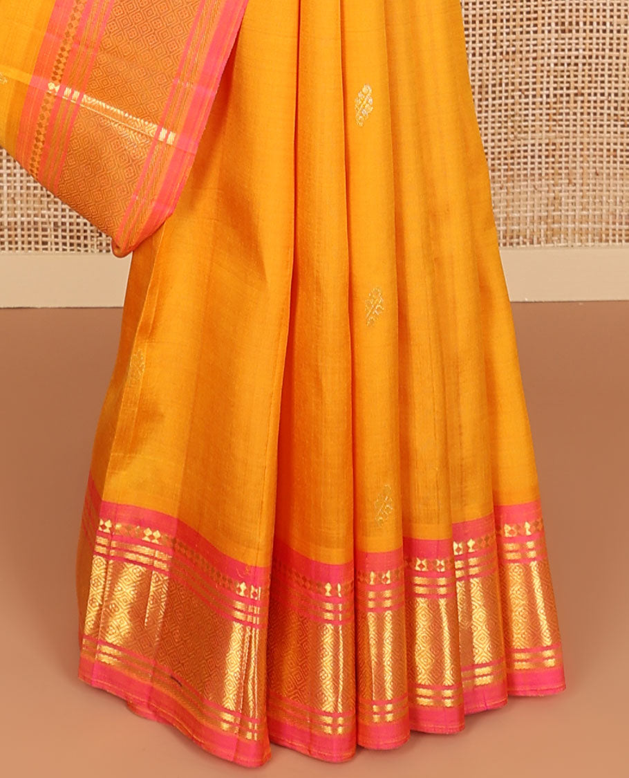 Orange buttas kancheepuram silk saree with contrast intricate zari design border & floral zari design pallu
