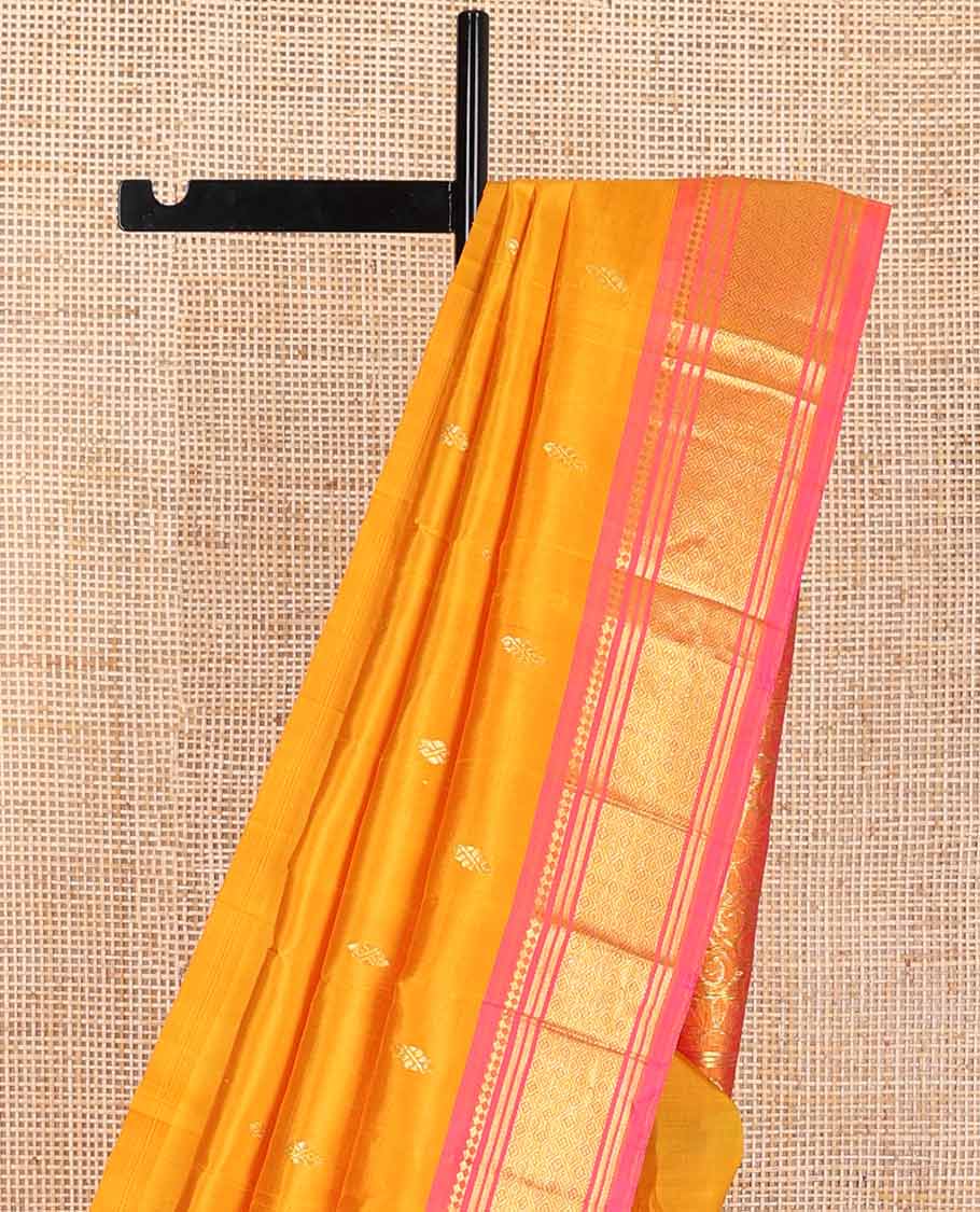 Orange buttas kancheepuram silk saree with contrast intricate zari design border & floral zari design pallu