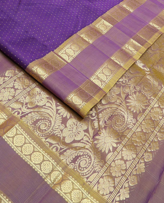 Violet buttas kanchipuram silk saree, contrast rettai pettu one-sided zari border of rekku,banaras & chakram & floral design pallu