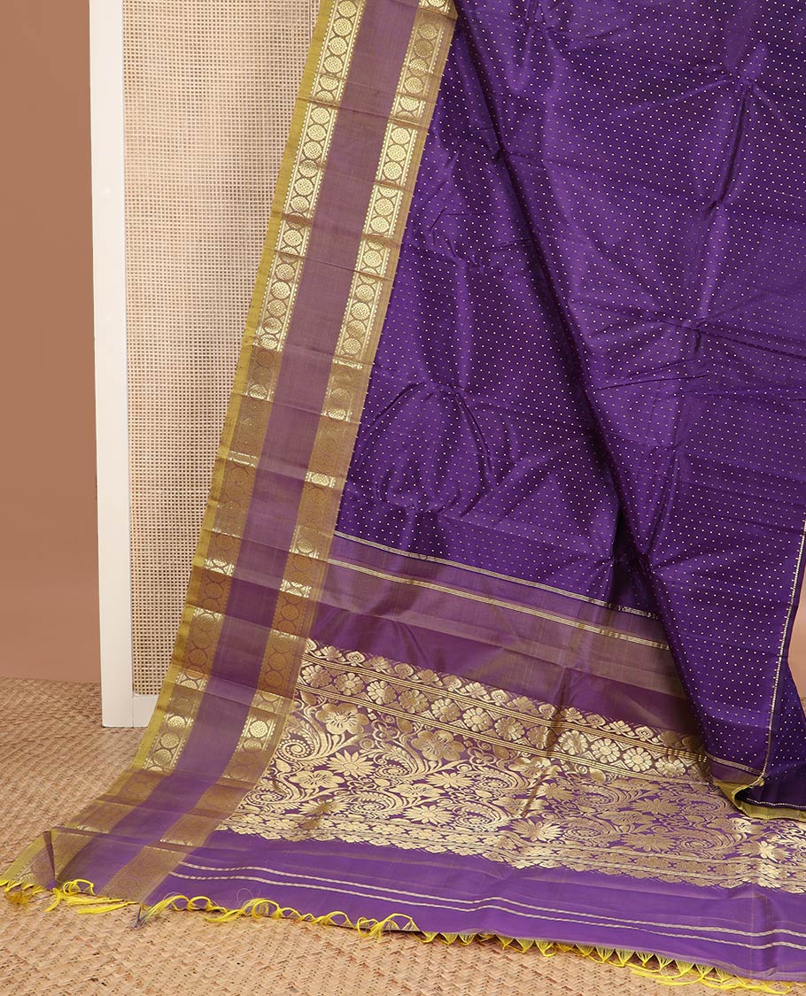 Violet buttas kanchipuram silk saree, contrast rettai pettu one-sided zari border of rekku,banaras & chakram & floral design pallu