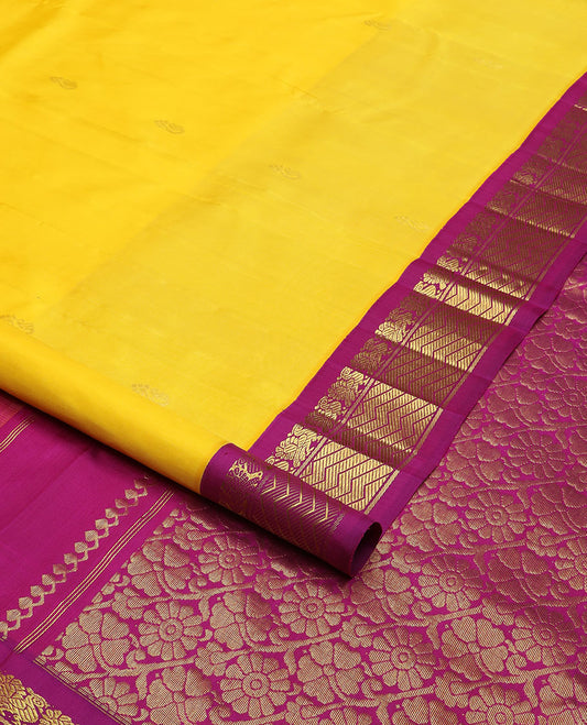 Yellow zari buttas Kanchipuram silk saree, contrast korvai border of mayil & geometric patterns & floral jaal pallu