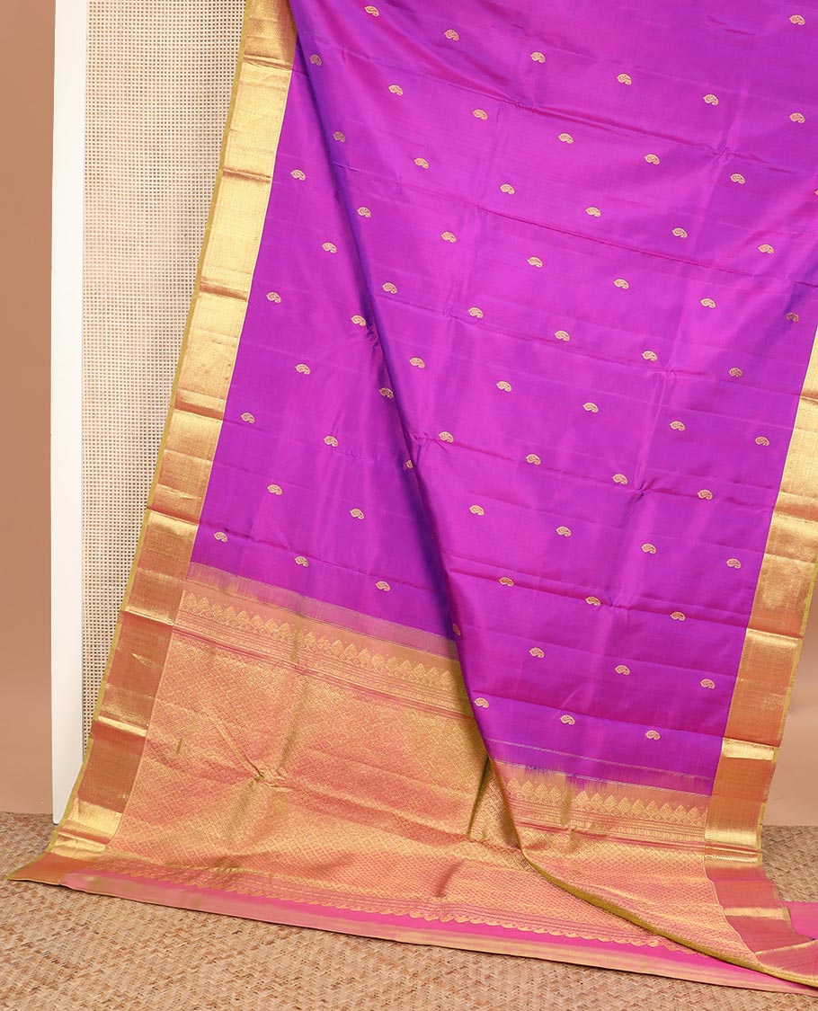 Rani pink zari buttas Kanchipuram silk saree, contrast traditional zari border, and kamalam designs steeped pallu