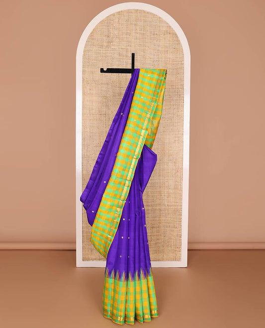 Blue kancheepuram silk saree with zari buttas, contrast one-sided thazampoo reku checked border of zari buttas & checked pallu of zari designs