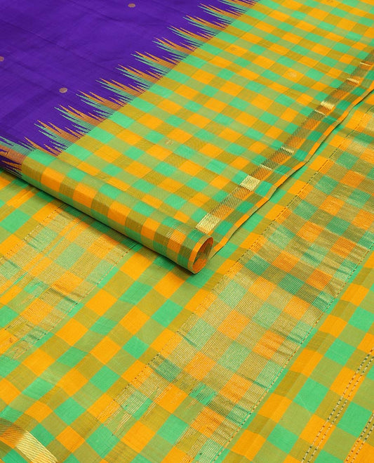 Blue kancheepuram silk saree with zari buttas, contrast one-sided thazampoo reku checked border of zari buttas & checked pallu of zari designs