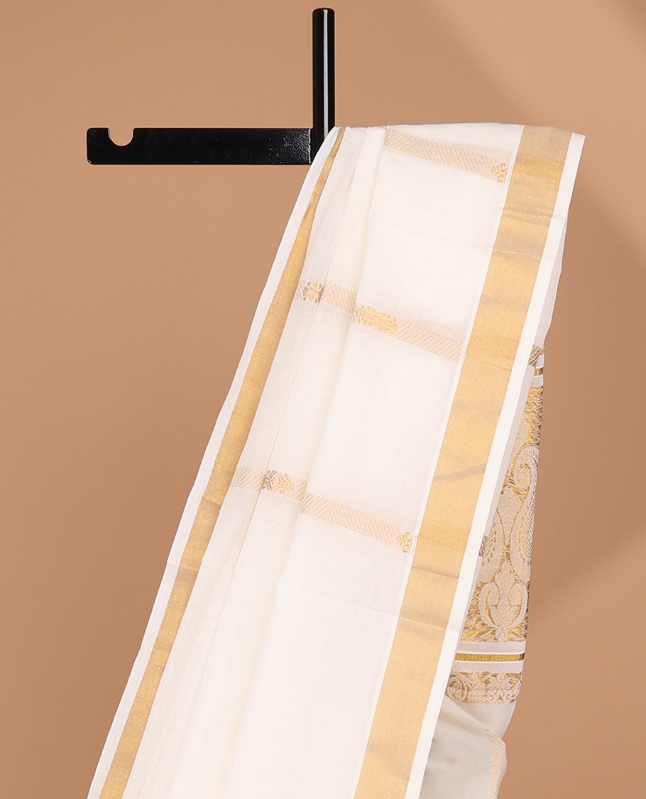 Cream kerala saree with zari stripes, zari border & pallu of floral & paisley zari designs