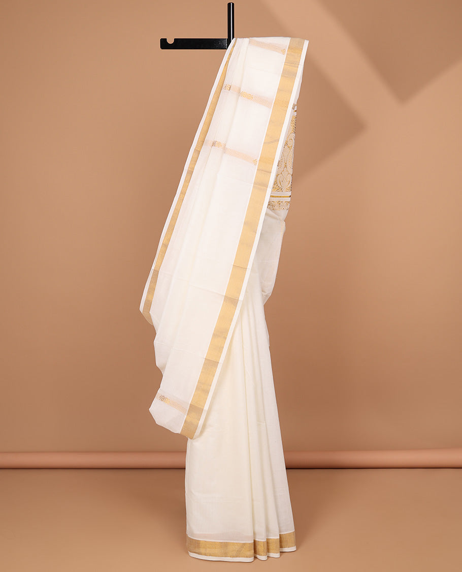 Cream kerala saree with zari stripes, zari border & pallu of floral & paisley zari designs
