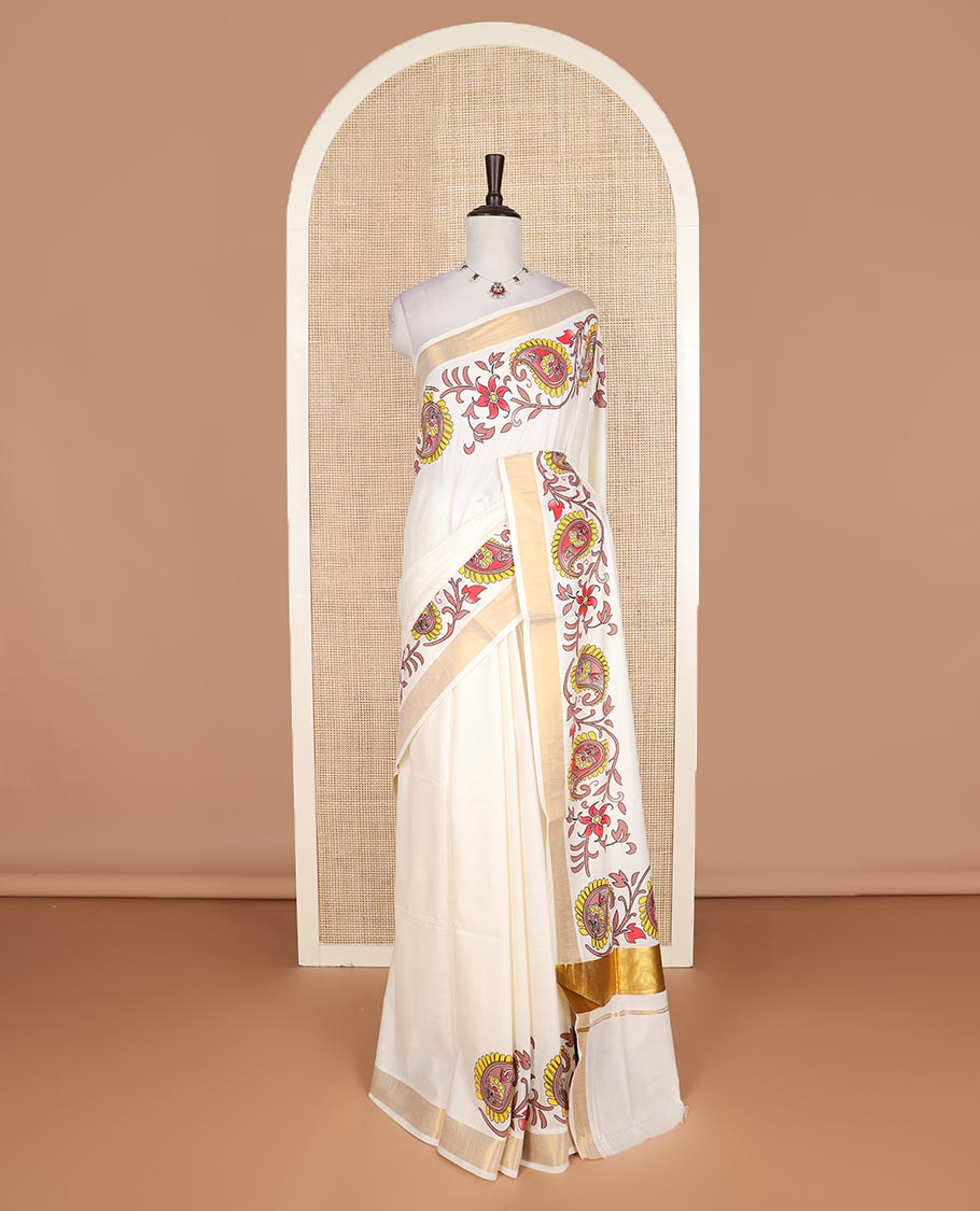 Cream floral, and paisley printed Kerala cotton saree, bavanji border, and floral, and paisley printed pallu
