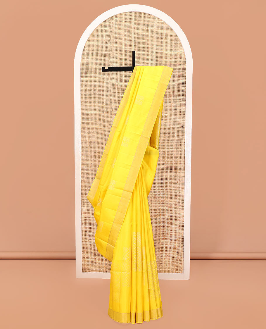 Yellow Mayuri Soft Silk Saree, Subtly Sparkled with Zari Designs All Over Its Body, Highlighted by Zari Border, Pallu of Ara Maadam Designs, and Paired with a Matching Blouse
