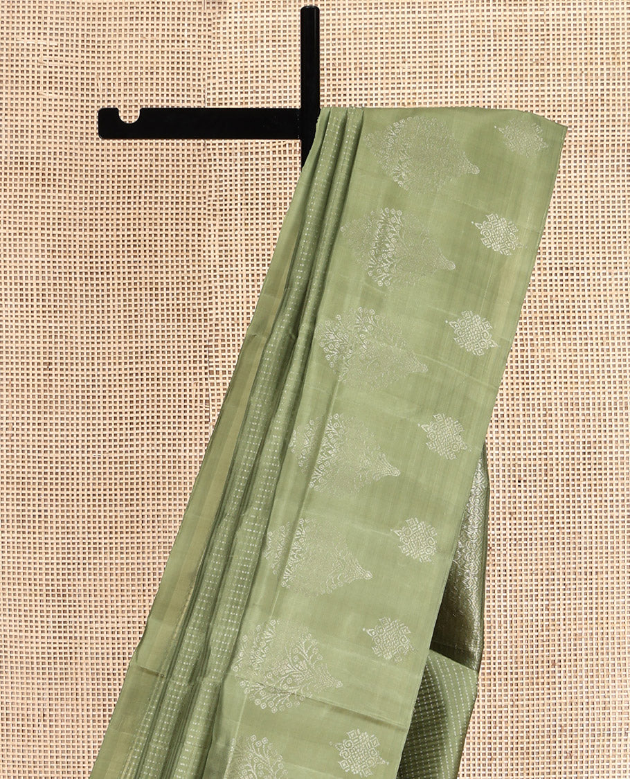 Green Mayuri Soft Silk Saree, Subtly Sparkled with Buttas, a Zari Border, Sparsely Woven Pallu, and a Matching Blouse
