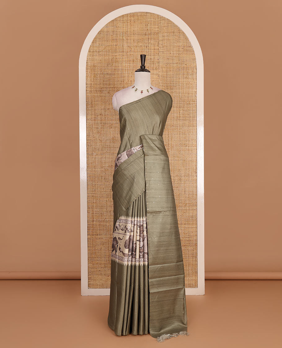 Borderless Green dobby style buttas and animal motifs printed semi tussar saree, contrast digital printed blouse