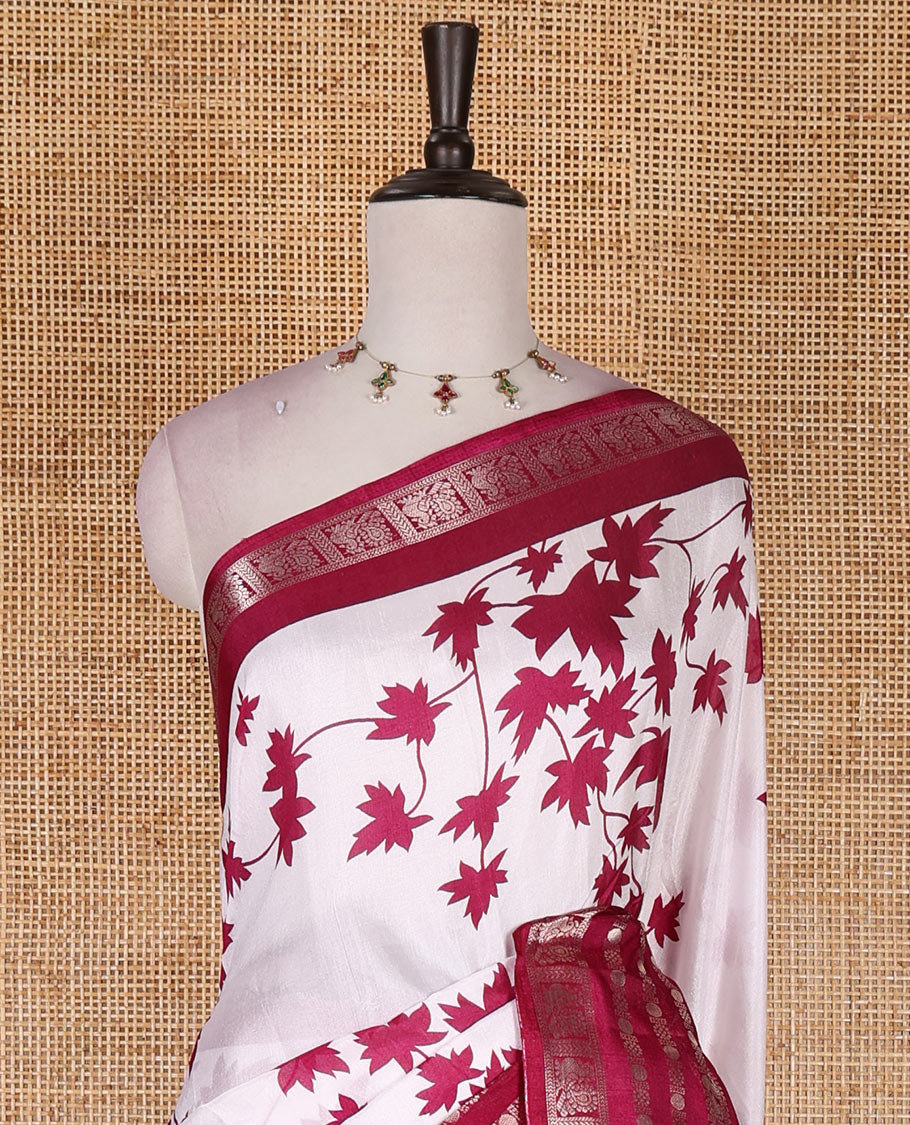Wine leaf motifs printed dola silk saree, contrast traditional zari border of Rudraksham and peacock motifs, geometric printed pallu and contrast printed blouse