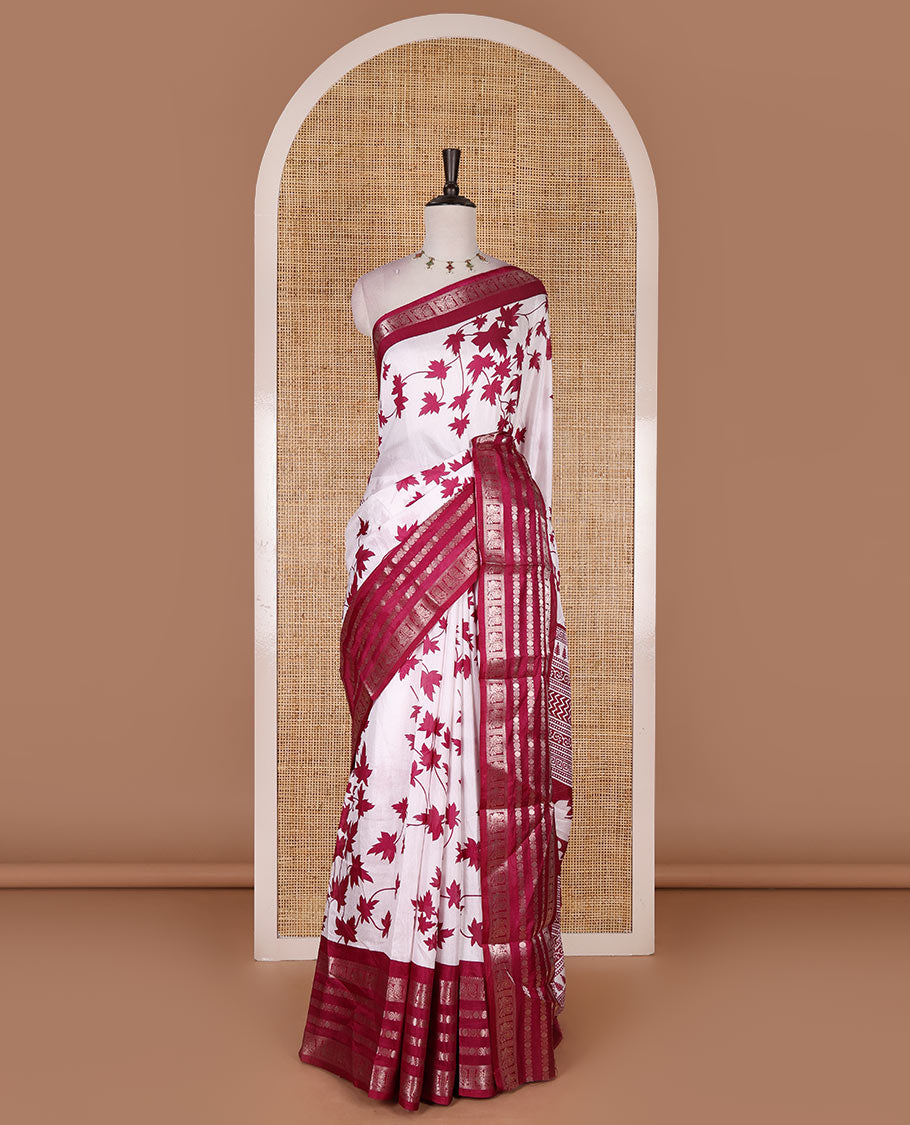Wine leaf motifs printed dola silk saree, contrast traditional zari border of Rudraksham and peacock motifs, geometric printed pallu and contrast printed blouse