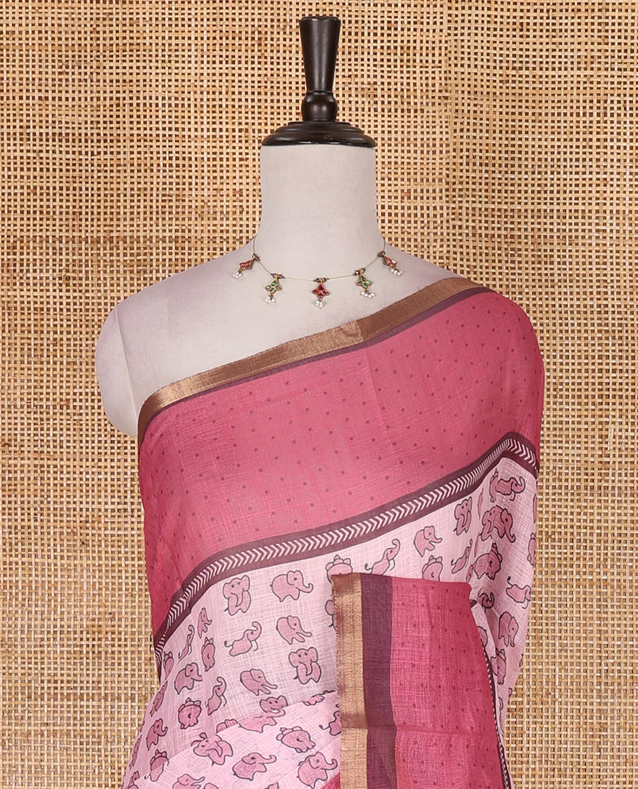 Baby pink cute elephant motifs printed linen cotton saree, contrast chevron border, pallu of stripes and chevron, and contrast printed blouse