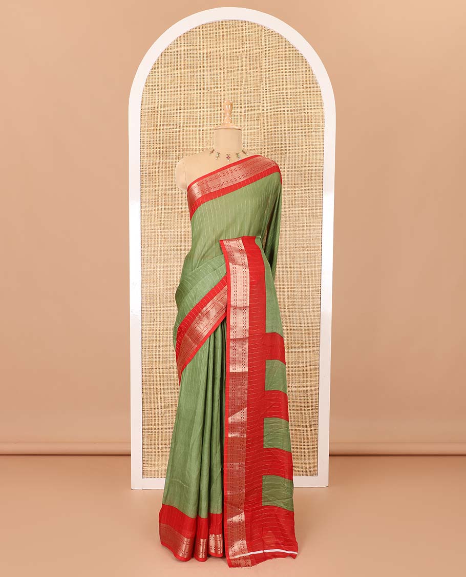 Green vertically striped moss chiffon saree with contrast traditional zari design borders, striped pallu, and a contrast blouse