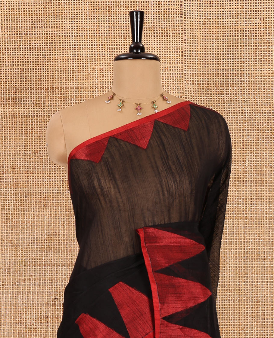Black and red plain khadi mul cotton saree, contrast thread temple border, plain pallu, and a contrast plain blouse
