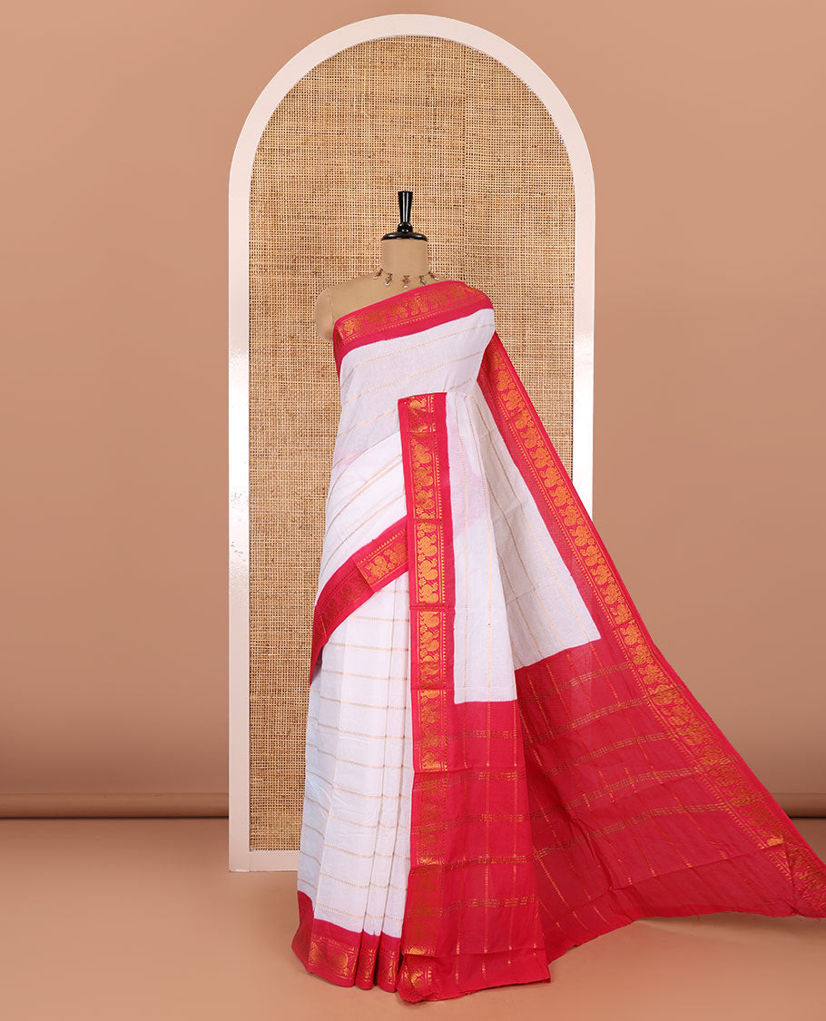 Half-white and rani pink Veldhari striped Sungudi cotton saree, contrast traditional border of peacock buttas, zari striped pallu, and a contrast blouse