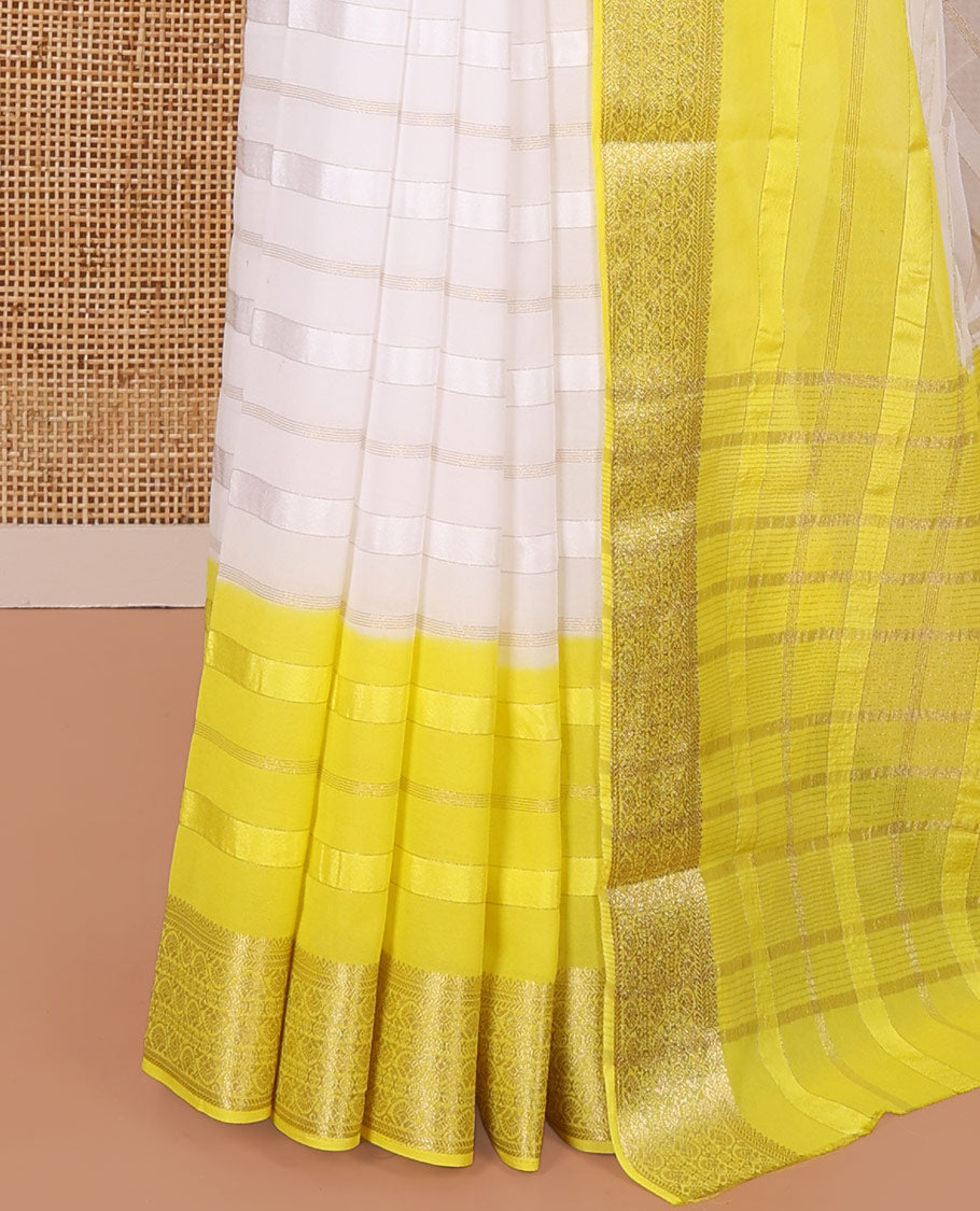 White and Yellow Georgette Saree, Subtly Sparkled with Horizontal Zari Stripes All Over Its Body, Complemented by a Contrast Traditional Zari Design Border, Gleaming Zari Striped Pallu, and Paired with a Contrast Blouse
