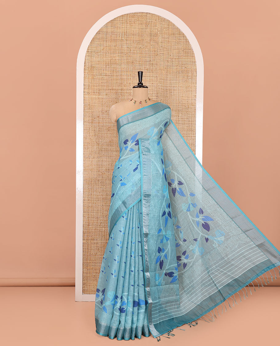 Blue Linen Cotton Saree, Prettified with Leaf Vine Printed on Its Body, Contrast Bavanji Border, Printed Pallu, and Paired with a Contrast Blouse