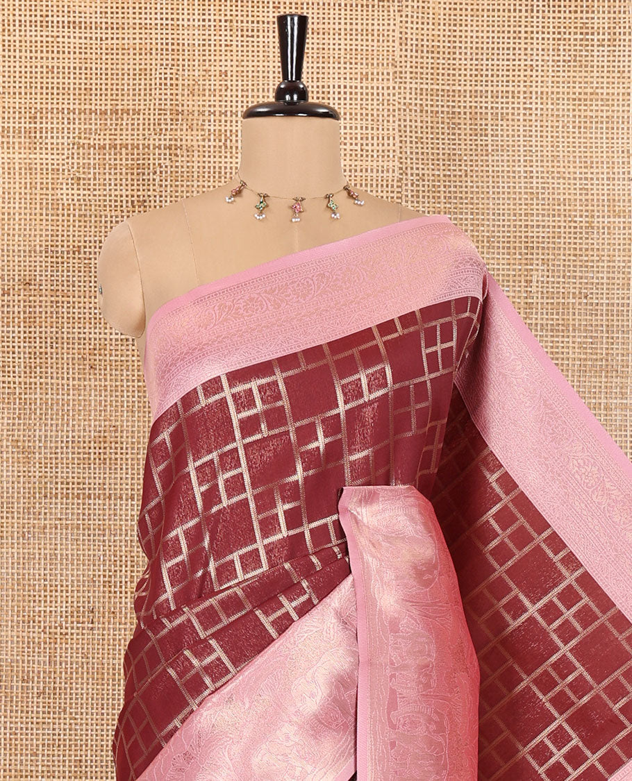 Maroon Elite Soft Silk Saree, Enriched with Checked Design on Its Body, Complemented by a Contrast Border of Jungle-Themed Flora-Fauna Motifs, a Pallu of Checked Design, and Paired with a Contrast Blouse