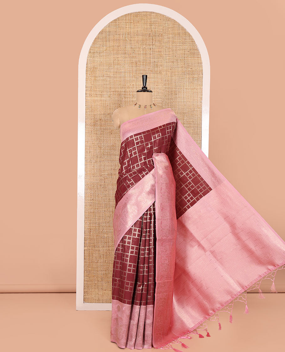 Maroon Elite Soft Silk Saree, Enriched with Checked Design on Its Body, Complemented by a Contrast Border of Jungle-Themed Flora-Fauna Motifs, a Pallu of Checked Design, and Paired with a Contrast Blouse