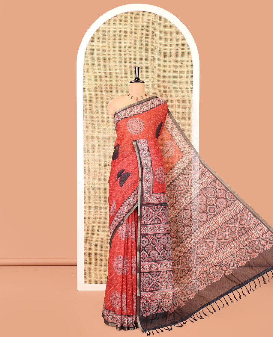 Red Linen Cotton Saree, Enthralled with Polka Dots and Ajrakh Polka Dot Printed on Its Body, Complemented by a Contrast Ajrakh Printed Border, Intricately Ajrakh Printed Pallu, and Paired with a Contrast Blouse