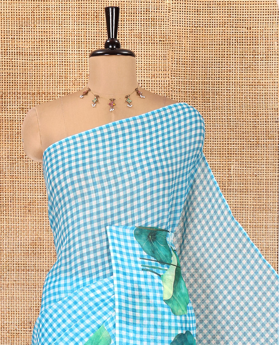 Borderless Blue Linen Cotton Saree, Bedecked with Micro-Checks and Pichwai Lotus Print, a Subtle Pallu, and a Matching Blouse