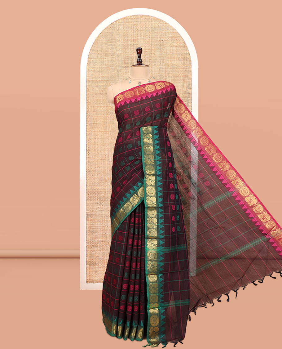 Brown Chettinad Cotton Saree Features Butta Enclosed Checks, a Contrast Temple Annam-Peacock Ganga-Jamuna Border, and a Matching Blouse