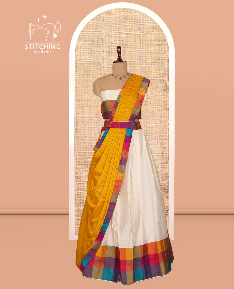 Cream-Mustard Semi- Silk Plain Half-Saree, Contrast Madras Checked Border, Matching Blouse and a Contrast Syska Georgette Dhavani