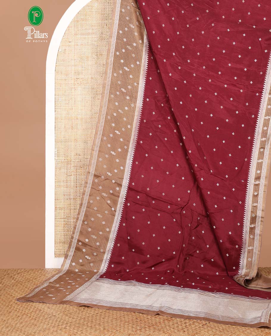 Maroon zari dola silk saree with banaras border & rich pallu along with plain blouse