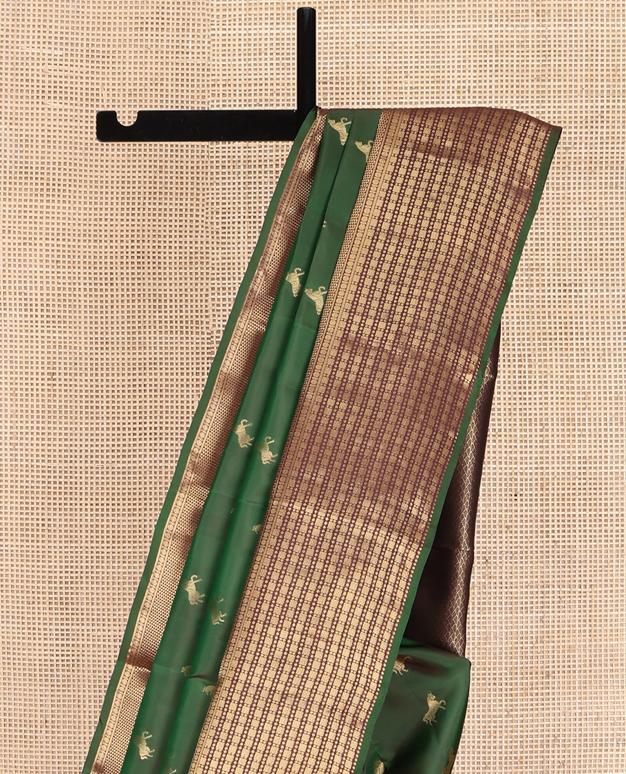 Green Vasundhara Lite Silk Mix Saree, Majestically Detailed with Zari Buttas on Its Body, Complemented by a Contrast Border of Rekku, Kathir, Rudraksham, and Ara Maadam Designs, Grand Geometric Patterned Pallu, and Paired with a Contrast Blouse