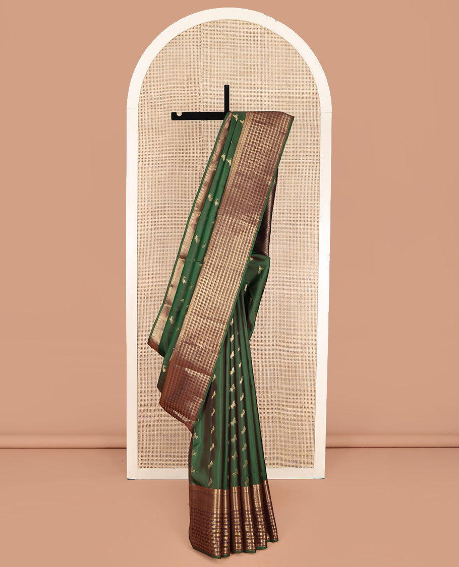 Green Vasundhara Lite Silk Mix Saree, Majestically Detailed with Zari Buttas on Its Body, Complemented by a Contrast Border of Rekku, Kathir, Rudraksham, and Ara Maadam Designs, Grand Geometric Patterned Pallu, and Paired with a Contrast Blouse