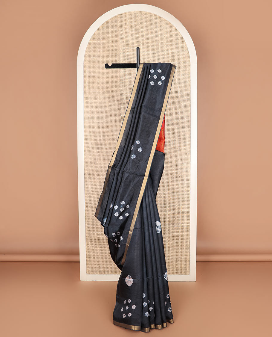 Black shibori printed banana pith saree, piping border, and contrast shibori print with zari stripes