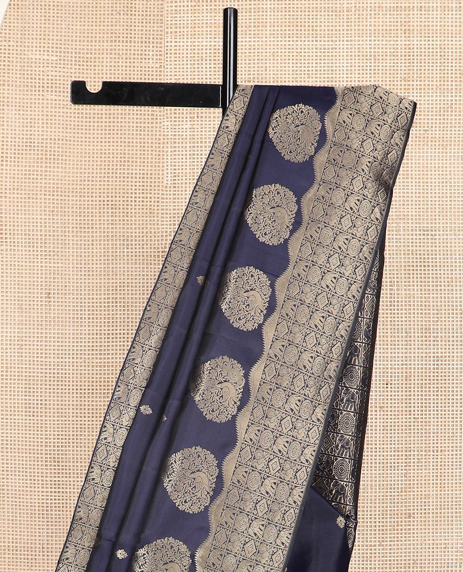 Navy blue zari buttas silk saree, zari border and pallu of zai yaanai, mayil, chakram, and diamond buttas enclosed checks