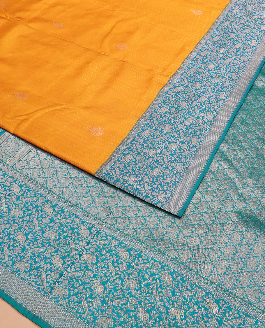 Yellow striped and zari buttas silk saree with contrast vanasingaram border of yaanai, killi, and kodi visiry designs, and jaal pallu