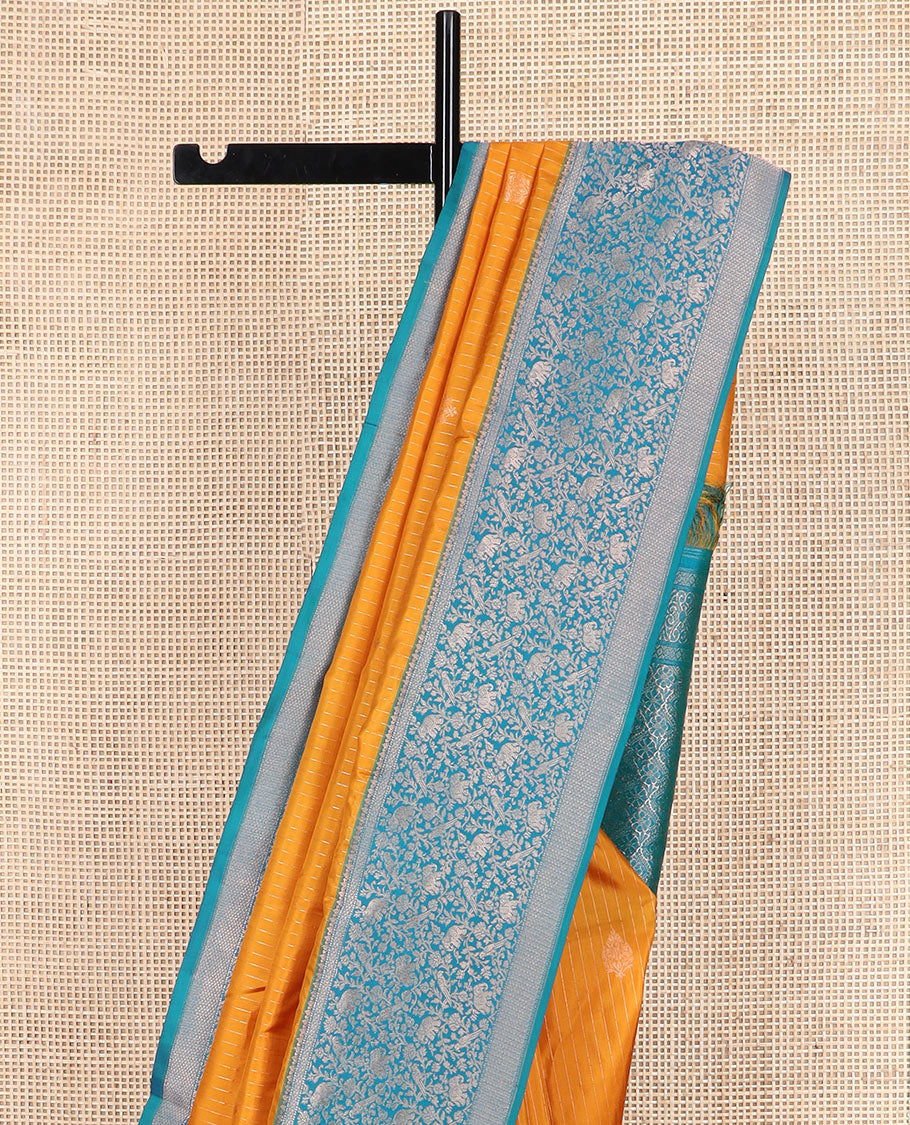 Yellow striped and zari buttas silk saree with contrast vanasingaram border of yaanai, killi, and kodi visiry designs, and jaal pallu