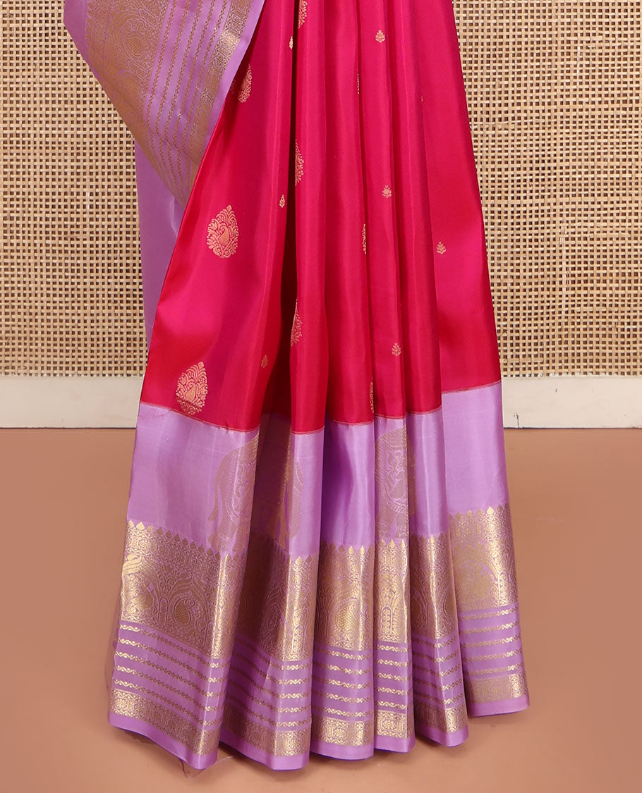 Pink Vasundhara Lite Silk Mix Saree, Adorned with Zari Buttas on Its Body, Complemented by a Contrast Border of Yaanai, Thilakam Mokku, Neli, Mayil, Arumbu Manga, and Kamalam Designs, Grand Ogee-Patterned Pallu, and Paired with a Contrast Blouse