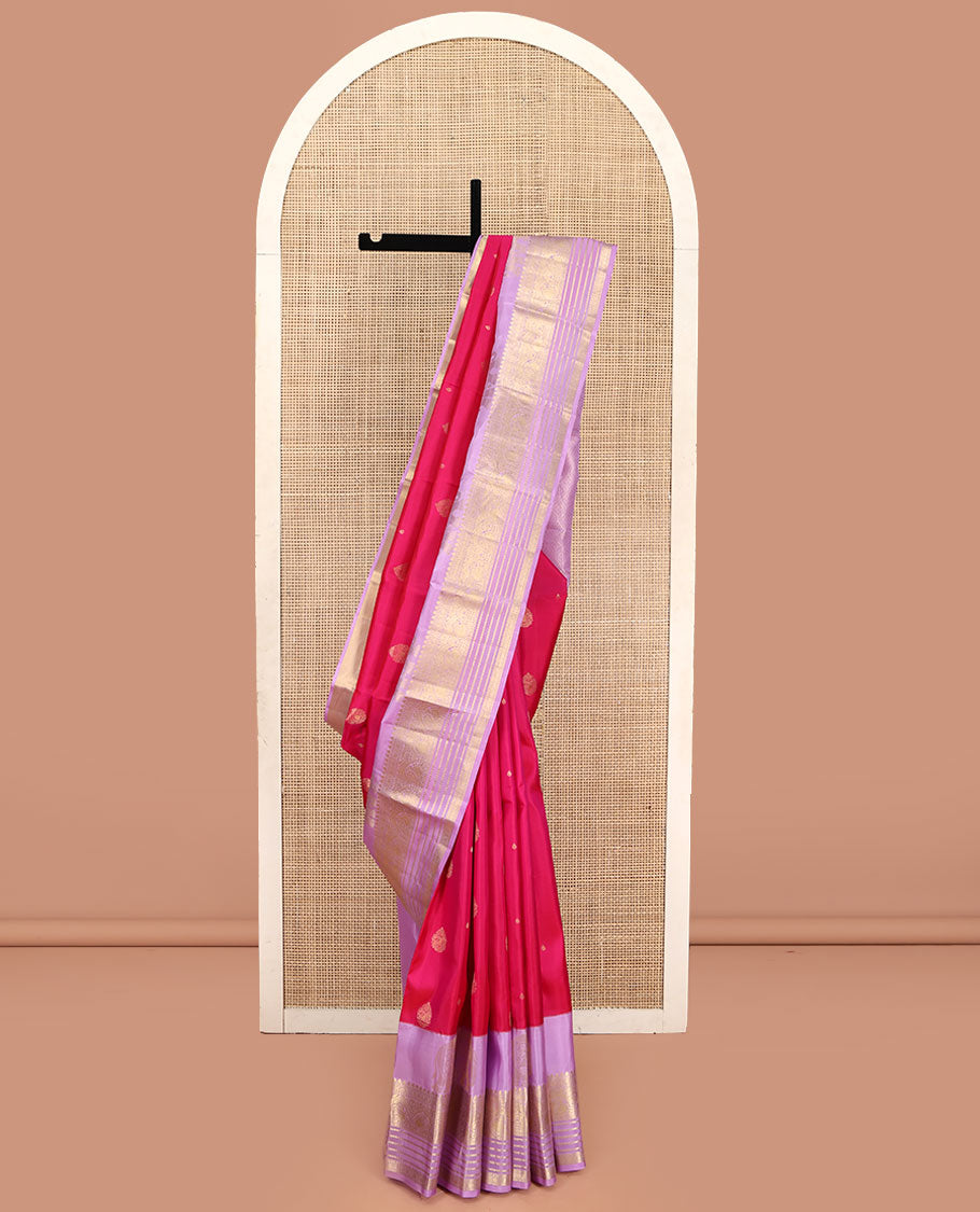 Pink Vasundhara Lite Silk Mix Saree, Adorned with Zari Buttas on Its Body, Complemented by a Contrast Border of Yaanai, Thilakam Mokku, Neli, Mayil, Arumbu Manga, and Kamalam Designs, Grand Ogee-Patterned Pallu, and Paired with a Contrast Blouse