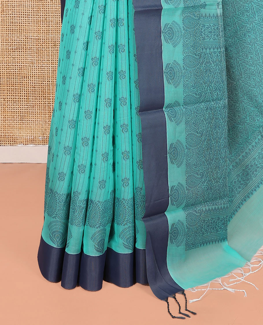 Green Semi-Silk Cotton Saree, Subtly Sparkled with Stripes and Buttas All Over Its Body, Complemented by Contrast Border, Intricately Designed Pallu, and Paired with a Matching Blouse